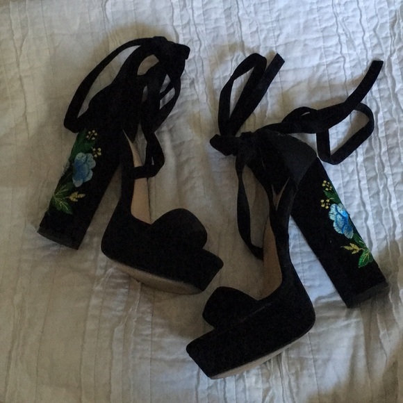 black heels with embroidered flowers
